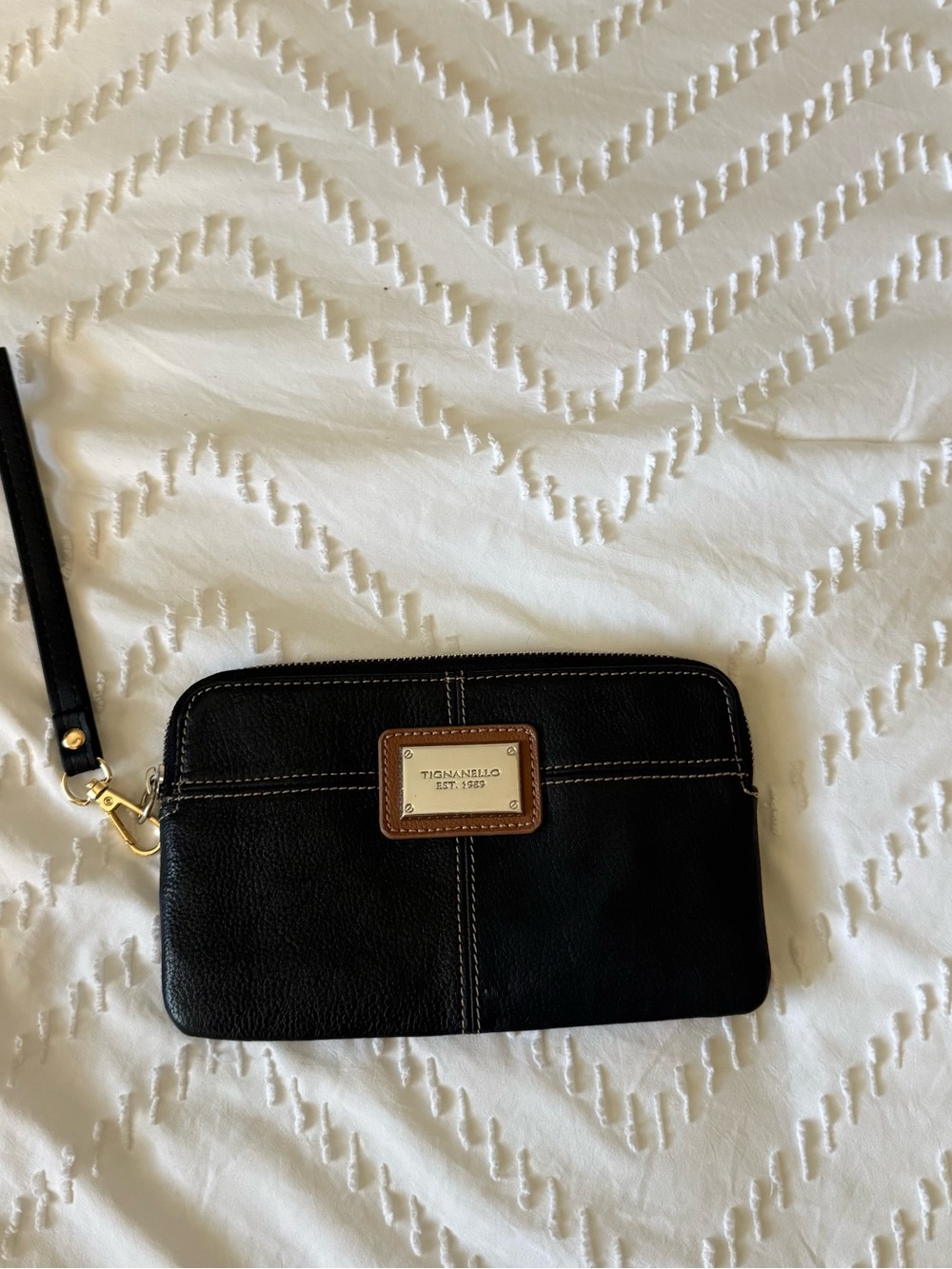Tignanello Black Leather Wristlet with Gold Plaque